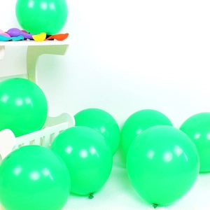 Detail of 10-inch emerald green latex balloons for wedding party arch decorations