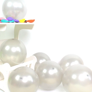 Detail of 10-inch thick silver metallic latex balloon with glossy reflective finish