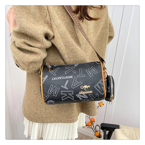 Detail of black Boston bag with white letters, golden kangaroo logo and small round coin purse
