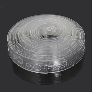 Detailed macro view of a 5m transparent balloon arch strip with double-hole design for party