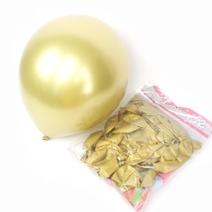 Shiny gold metallic balloons shown inflated and in packaging for birthday party decor