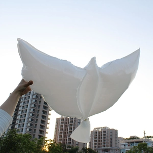 Flying white dove foil balloon for wedding ceremony and elegant outdoor party decor
