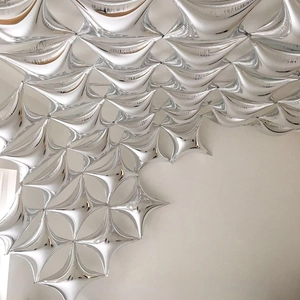 Glossy silver four-point star foil balloons for festive party and wedding venue decoration
