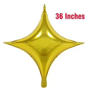 Detailed view of a 36-inch golden four-pointed star foil balloon with metallic finish