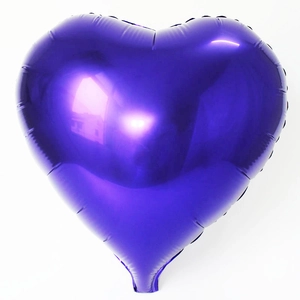 Detailed view of 18 inch heart shaped purple foil balloon with glossy metallic surface