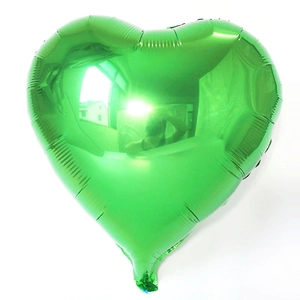 Detailed view of an 18-inch green heart-shaped foil balloon with reflective metallic finish