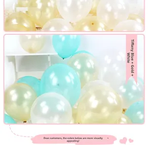 Macro shot of pearlized latex balloons in light blue, gold, and white party decor set