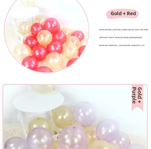Detail view of pearlescent latex balloons in gold, red, and purple for party decor