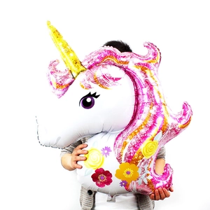 Large unicorn foil balloon with pink mane and gold horn for birthday party decoration