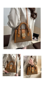 Detail of the brown monogram tote bag featuring a round gold M logo buckle and dual handles