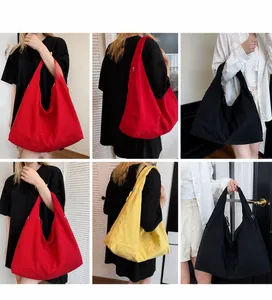 Detailed views of the large capacity tote bag in red, yellow, and black colors