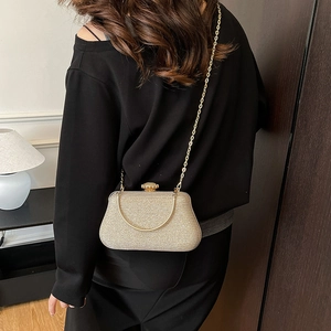 Elegante pochette da sera con paillettes color champagne con manico e tracolla