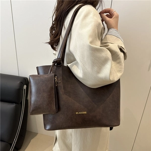 Minimalist large brown tote bag with small pouch and vintage leather texture
