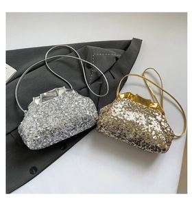 Detail showing ruffled top edge and sparkling sequins on silver and gold evening bags