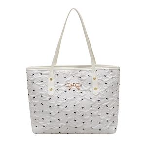 Grand sac cabas blanc avec motif nœuds noirs et boucle dorée pour le bureau