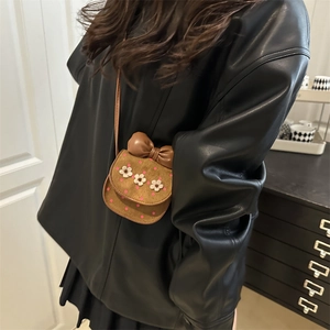 Brown suede mini crossbody bag for girls with white flower embroidery and bow detail