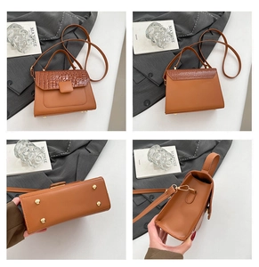 Detailed views of brown faux-leather crossbody bag with crocodile pattern and metal feet