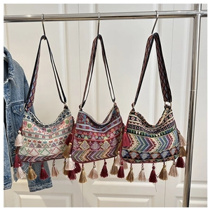 Detailed embroidery and vibrant tassels on Bohemian ethnic crossbody shoulder bags