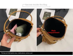 Dettaglio della borsa a tracolla marrone con frange e spazio per cellulare e altro