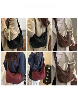 Detail view of stylish leopard print hobo bags in various colors with wide straps