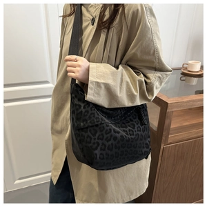 Leopard print crossbody bag with black wide strap and large capacity nylon material
