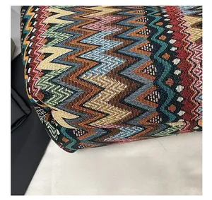 Detail showing precise stitching and colorful chevron woven texture on the tote bag