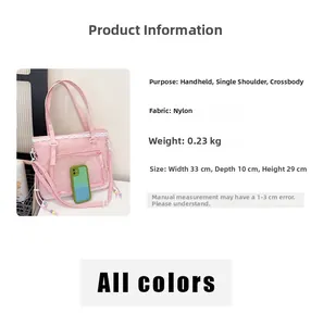 Pink nylon tote bag with lace detail, mesh pocket, and multi-way straps for versatility