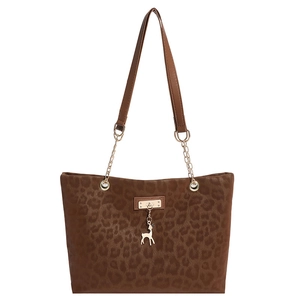 Brown leopard print tote bag with golden deer pendant and chain shoulder strap