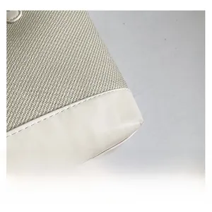 Detailed close-up showing the contrast stitching and premium fabric texture of this tote bag