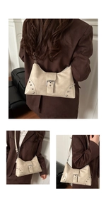 Detailed views of a beige rivet tote bag with silver studs and adjustable shoulder strap