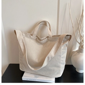 Grand sac fourre-tout beige en velours côtelé avec deux bretelles pour le quotidien
