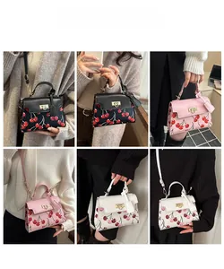 Collage of cherry print crossbody bags showing styling options in black, pink and white