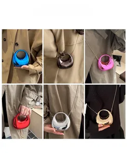 Metallic finish crescent crossbody bag collection in six vibrant reflective colors with gold chain