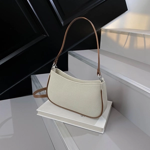 Retro contrast half-moon shoulder bag in beige canvas and brown leather trim for women