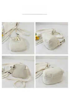Multi-angle view of beige corduroy shell bag with dual zippers and adjustable strap