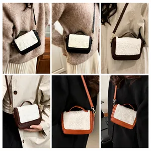 Mini square crossbody bag featuring faux shearling flap and leather body detail