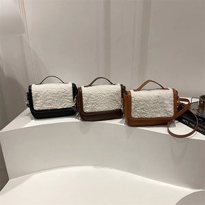 Minimalist square crossbody bag with faux shearling flap in three classic color options