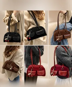 Collage of chic suede underarm bags in black, coffee, and red with cherry charms