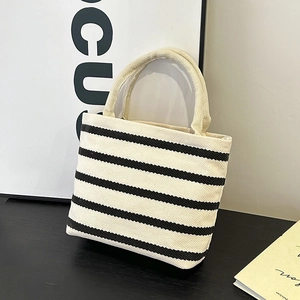 Sac à main moderne en toile à rayures noires et blanches avec anses en tissu crème