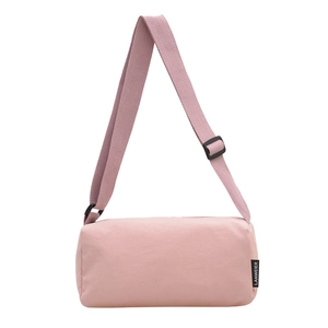 Pink nylon cylinder crossbody bag for women with wide adjustable shoulder strap