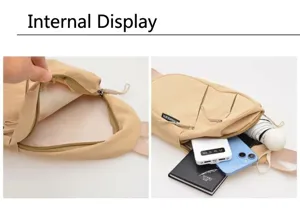 Detail view of the spacious inner compartments of the khaki versatile crossbody chest bag