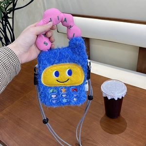 Cute blue plush mini crossbody bag with yellow smiley face and pink handle detail