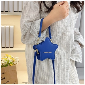 Star-shaped bright blue crossbody bag with gold zipper and adjustable shoulder strap