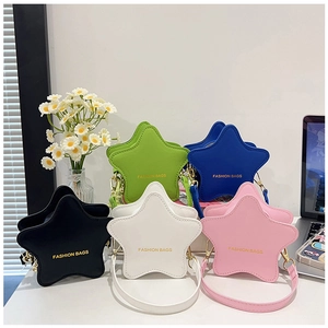 Detail of star-shaped crossbody bags in five colors with fine stitching and gold lettering