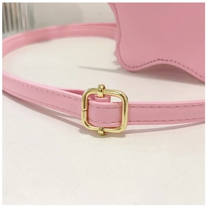 Detail of pink leather strap with gold metal buckle and precise edge stitching
