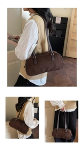 Detail of the high-quality brown faux suede vintage shoulder bag with sturdy stitching
