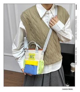 Fashionable Oxford crossbody bag with colorful patchwork and block style H logo detail
