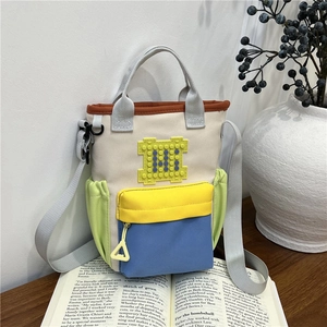 Minimalist oxford cloth crossbody bag with colorful block patterns for women and kids