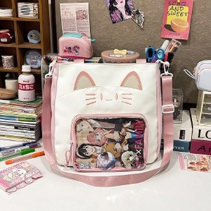 Kawaii Katzen-Umhängetasche in Pink und Weiß mit transparentem Fenster für Pins