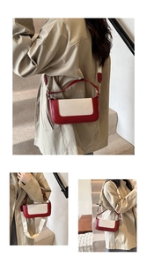 Detail of red leather and cream canvas contrast stitching on women's small square bag